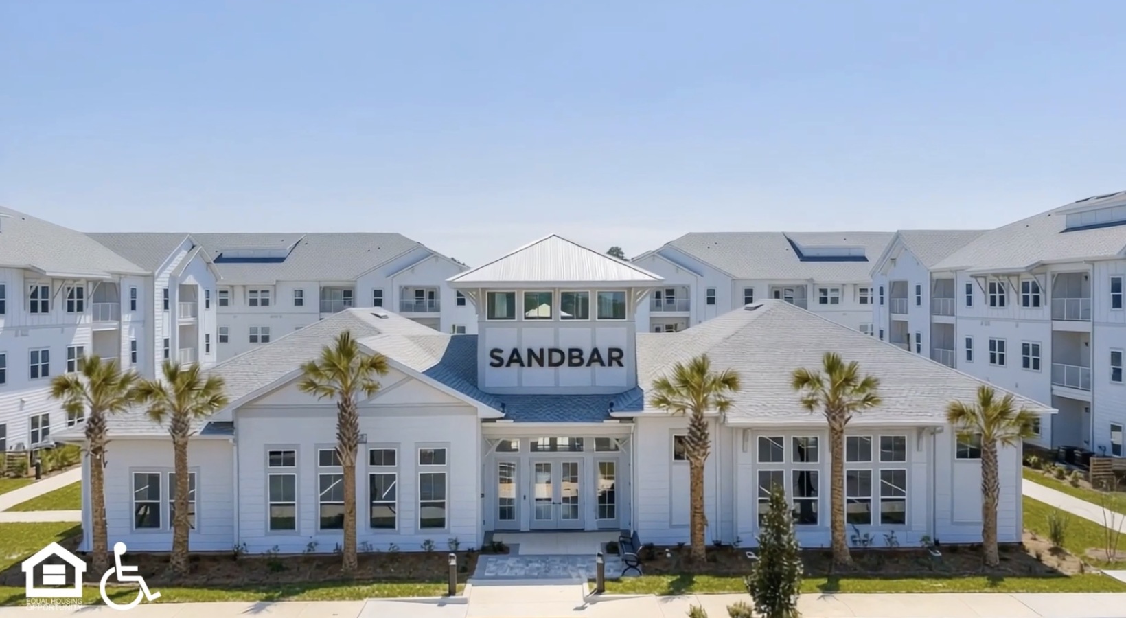 an aerial shot of Sandbar with a blue sky
